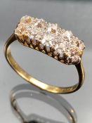 Diamond Ring set with Ten old mine cut Diamonds. Diamonds set in Platinum with 18ct yellow gold ring