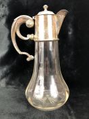 Silver Birmingham 1910 hallmarked Claret Jug with Glass body and ornate Silver handle, collar and