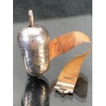Silver tape measure in the form a small acorn, tape with silver tip and silver winding mechanism