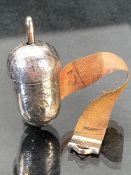 Silver tape measure in the form a small acorn, tape with silver tip and silver winding mechanism