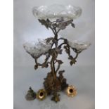 A sculptural Victorian Epergne of silver-plated Rococo Revival base with vines holding removable