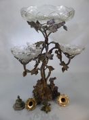 A sculptural Victorian Epergne of silver-plated Rococo Revival base with vines holding removable