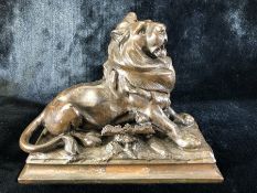 Bronzed lion inkwell with ornate pen holder with signature to base