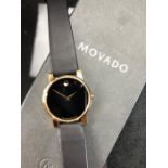 Movado wristwatch with black strap MODEL 87G40875 SERIAL 4272531 quartz movement in original box