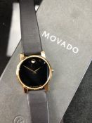 Movado wristwatch with black strap MODEL 87G40875 SERIAL 4272531 quartz movement in original box