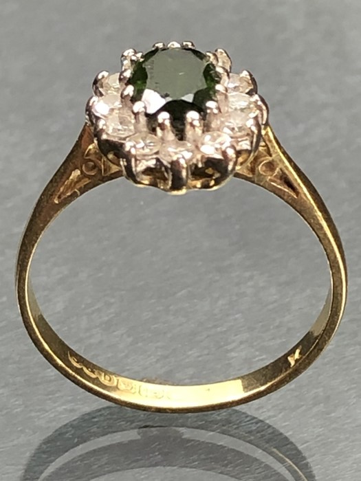 18ct yellow gold ring with large Oval faceted Peridot surrounded by twelve Diamonds (size 'Q' UK) - Image 5 of 6