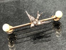 High Carat Gold brooch set with two Pearls and a central Gold Swallow set with Diamonds (total