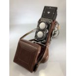 A Rolleiflex Rollei double lens camera, DBP DBGM 2.8f with double Carl Zeiss lens, with associated