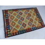 Vegetable dye wool chobi kilim rug approx. dimensions 150cm x 100cm