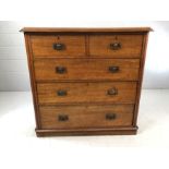 Mahogany chest of drawers, two over three, with copper handles