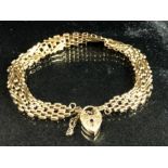 9ct Gold Bracelet with with heart shaped lock (weight approx 7g)