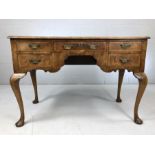 Queen Anne writing desk with five drawers and brass handles (A/F)