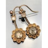 Pair Yellow Gold (Unmarked) drop earrings approx: 23.5mm drop of a Daisy head flower set with an