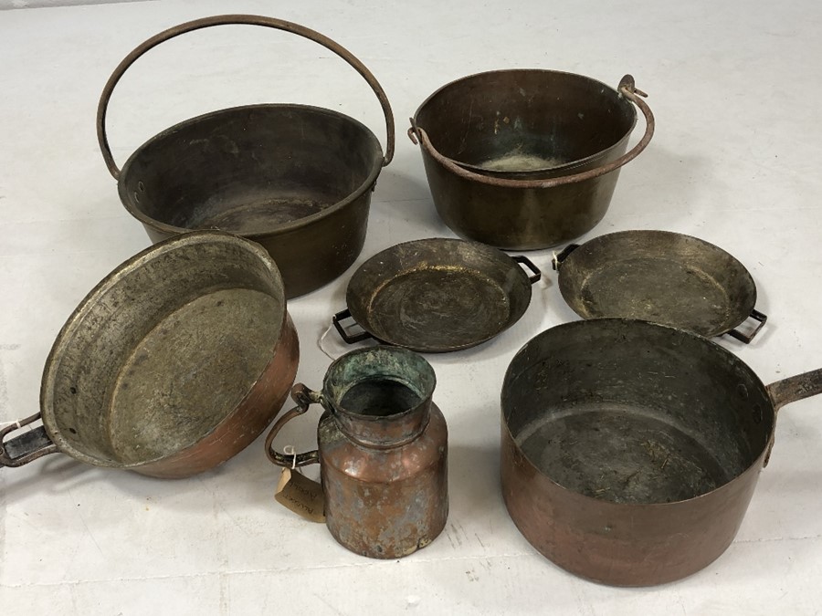 Collection of copper items mostly pans