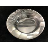 LALIQUE GLASS ASHTRAY with lions head to the border, signed 'Lalique France', approx 15cms diam