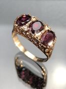 9ct Gold ring set with three large Garnets