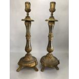 Large pair of ornate candle sticks on tripod lion paw feet approx 45cm high