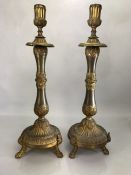 Large pair of ornate candle sticks on tripod lion paw feet approx 45cm high