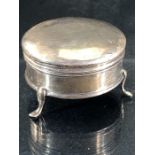 Silver lidded jewellery box on tripod support