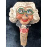 A Kinki-Bee Character bottle stopper and pourer in the form of an old lady