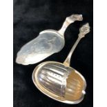 Rare continental silver sugar sifter spoon in the shape of a Walnut marked "K-90" and a small cake