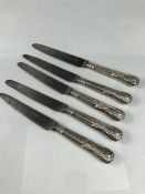Five large Silver hallmarked Kings Pattern knives London Hallmarked 1888 maker 'SH', blades marked