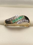 9ct Gold Diamond and Emerald crossover ring size 'M'