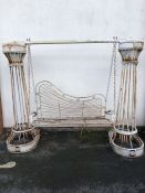 Architectural Salvage: Ornate Victorian swing seat on twisted metal ornate columns (in need of