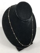 18ct White Gold fine trace-link Necklace chain, approx: 23” long and set with 20 approx: 0.05ct