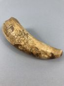 Scrimshaw: approx 15cm long and believed to be the tooth of a Sperm whale this rare scrimshaw