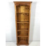 Tall pine bookcase with four shelves