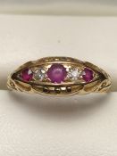 Vintage 18ct Gold Boat ring set with Ruby's and Diamonds in an ornate Gold setting size 'P'