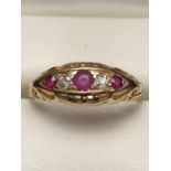 Vintage 18ct Gold Boat ring set with Ruby's and Diamonds in an ornate Gold setting size 'P'