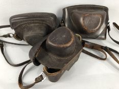 Three original brown leather Leica camera cases