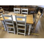 Modern Pine Kitchen table with painted legs and two drawers accompanied by six rush seated dining