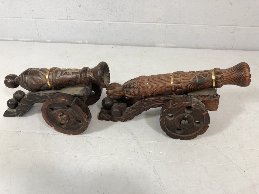 Two wooden carved and brass-bound cannons, the larger approx 52cm in length - Image 2 of 4