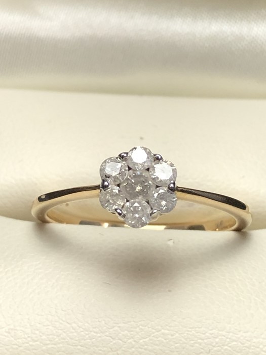 9ct Gold Daisy cluster Diamond ring with certificate stating est Carat weight 0.5 carat of seven