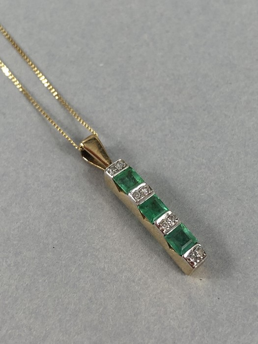 9ct Gold pendant set with Diamonds and Green square cut Emeralds on 9ct fine necklace