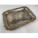 Hallmarked 1897 Birmingham silver platter with repousse decoration (approx 674g) maker Deykin &