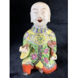 Chinese hand-painted porcelain figure, possibly a whistle or wind instrument, approx 18cm in