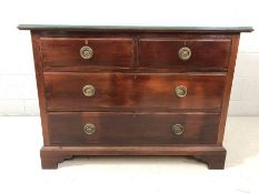 Chest of drawers with metal ring handles