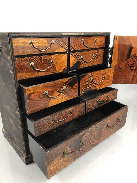 A Japanese Teisho period (1912-26) lacquered and specimen wood table cabinet, the interior with - Image 14 of 17