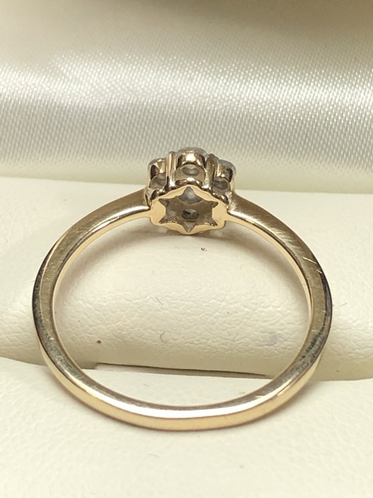 9ct Gold Daisy cluster Diamond ring with certificate stating est Carat weight 0.5 carat of seven - Image 3 of 8