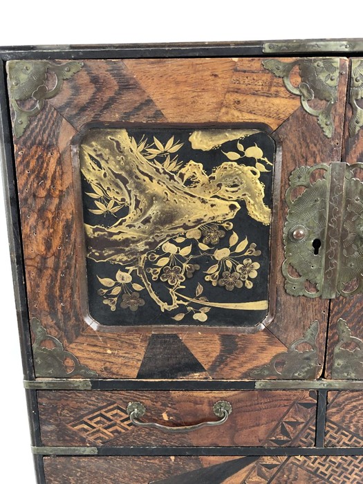 A Japanese Teisho period (1912-26) lacquered and specimen wood table cabinet, the interior with - Image 2 of 17