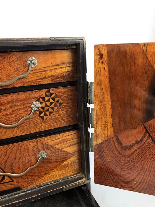 A Japanese Teisho period (1912-26) lacquered and specimen wood table cabinet, the interior with - Image 11 of 17