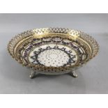 Ceramic Bowl with pierced decoration and on three Gilt painted feet marked Dresden 07