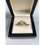 9ct Hallmarked 375 Gold ring set with a single Diamond