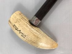 Walking cane with Whale tooth as a handle inscribed "Moby Dick" with a silver collar