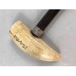 Walking cane with Whale tooth as a handle inscribed "Moby Dick" with a silver collar