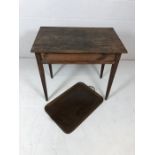 Oak occasional table on tapering legs along with a butlers tray